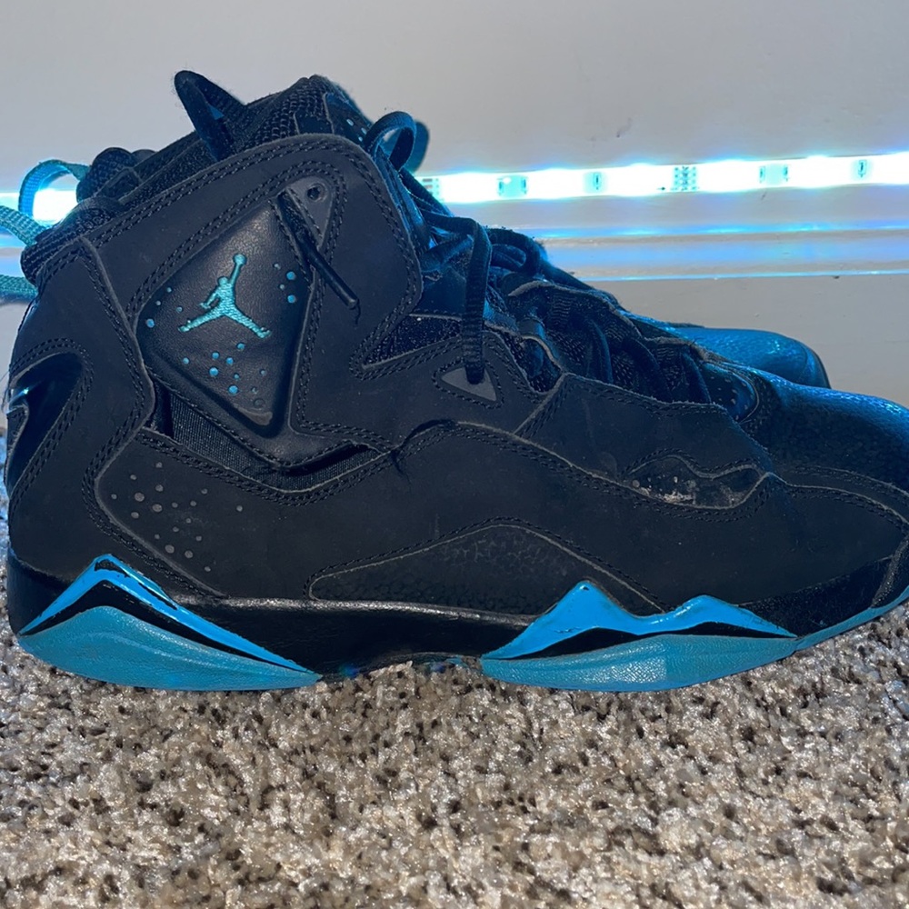 Black and blue Jordans